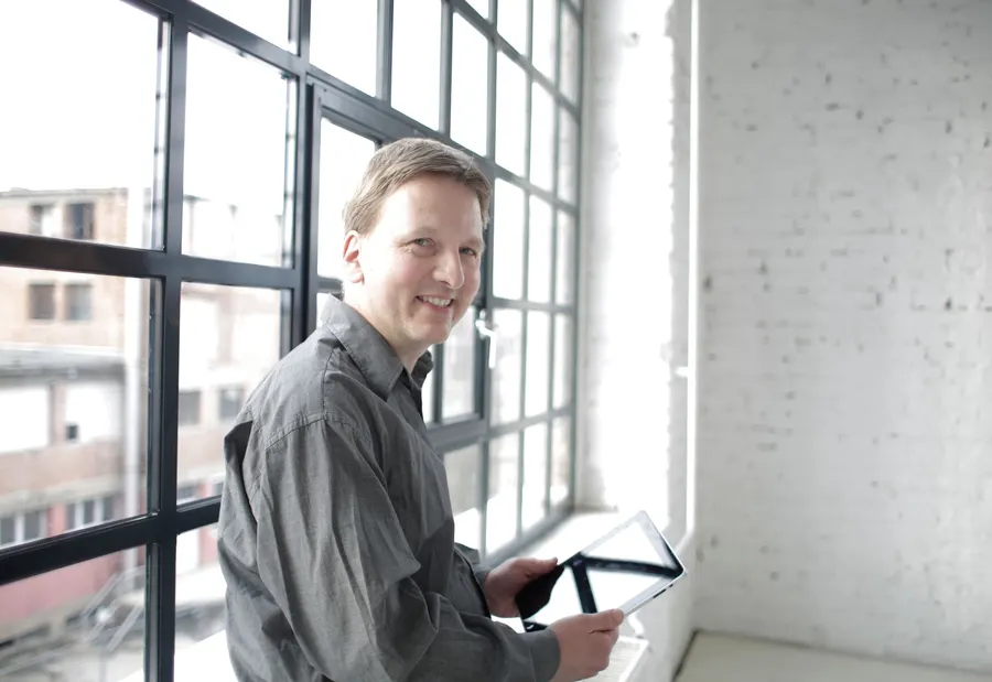 Adult using a tablet in an everyday setting