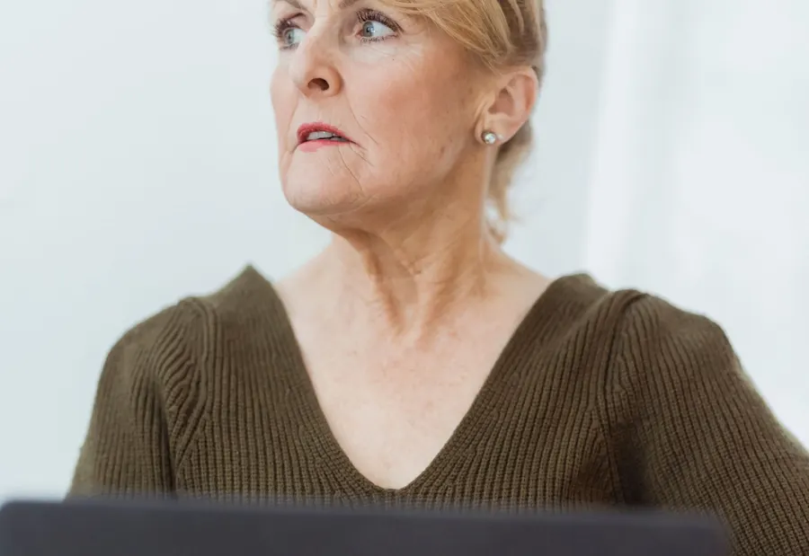 Adult working with a computer in an everyday setting